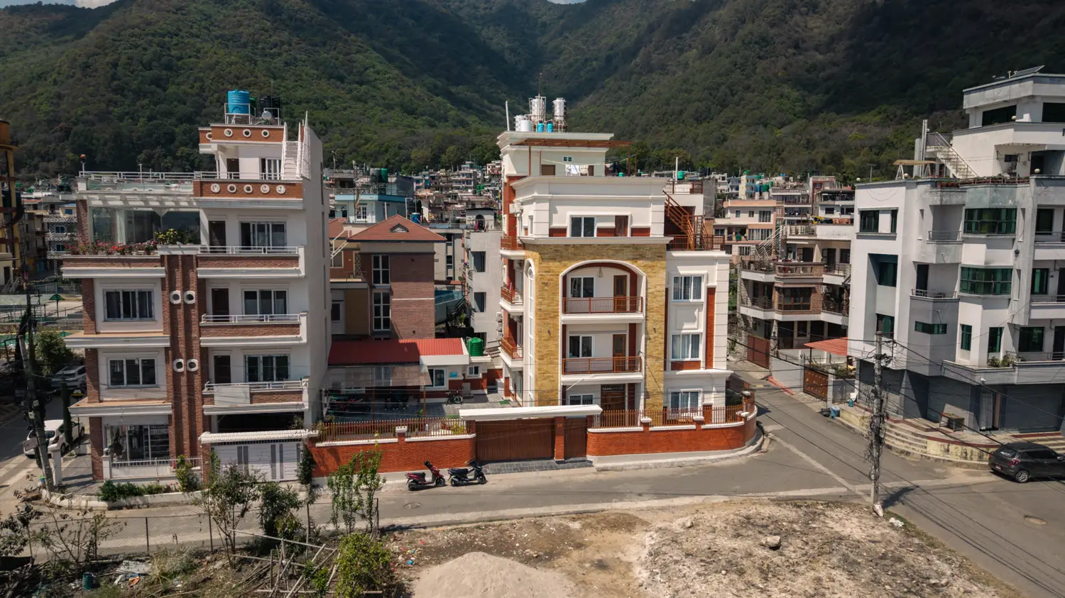 The building with the green Nagarjun hill directly behind